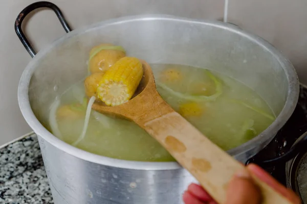 Pot Fire Vegetables Corn Wooden Spoon Stirring Soup — Stock Photo, Image