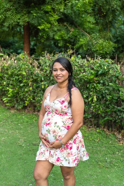 Pregnant Woman Holding Her Belly While Laughing — Foto de Stock