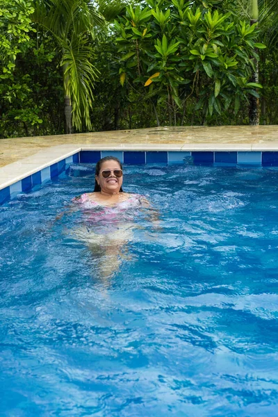 Latin Woman Relaxing Swimming Pool —  Fotos de Stock