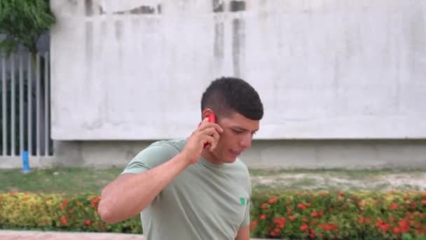 Man Talking His Phone While Walking Park — Video Stock