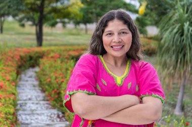 Woman wearing traditional Indian tribal dress in a park