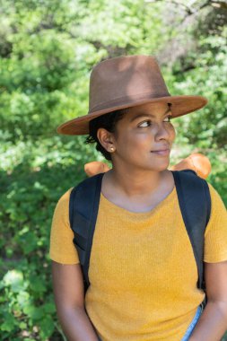 Young girl enjoys freedom in the forest