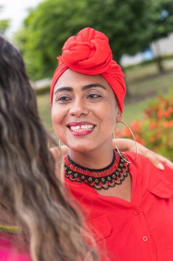 Latin Women Meet Outdoor And Talk clipart