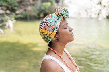 Latina woman in colorful native costume