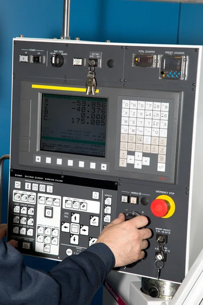 Man hand  the controls of a machine CNC — Stock Photo, Image
