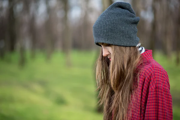 Sad woman deep in thought outdoors — Stock Photo, Image