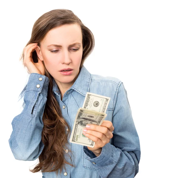 Young unhappy woman with money — Stock Photo, Image