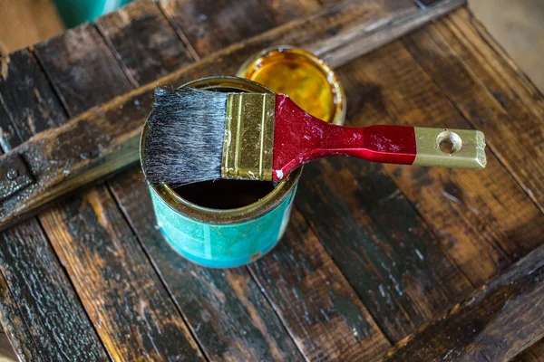Protective varnish and a brush — Stock Photo, Image