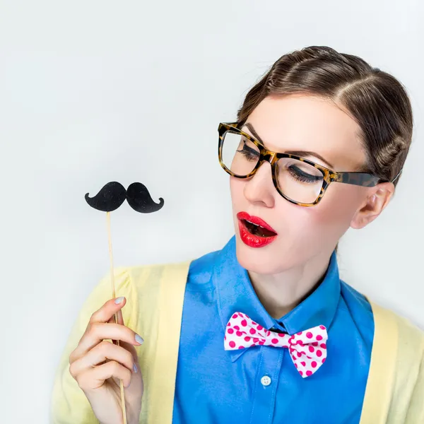 Funny cute girl in tie and mustache — Stockfoto