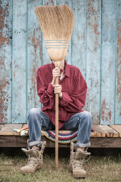 Funny woman with broom — Stock Photo, Image