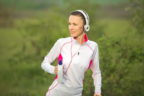 Happy female runner — Stock Photo, Image