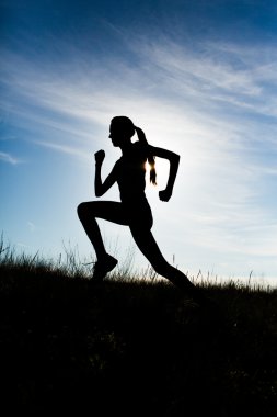 Koşan kadın silueti