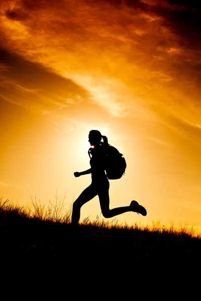 Laufende Frau, Backpacker — Stockfoto