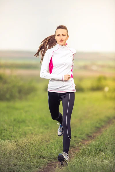 Rennende vrouw. — Stockfoto