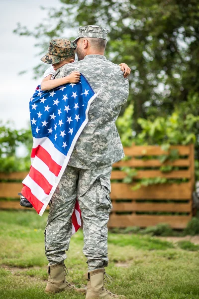 Father hugs his son. American family — Stock Photo, Image