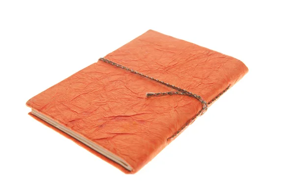 Πορτοκαλί δεσμεύεται εφημερίδα, απομονωμένες ημερολόγιο — Φωτογραφία Αρχείου