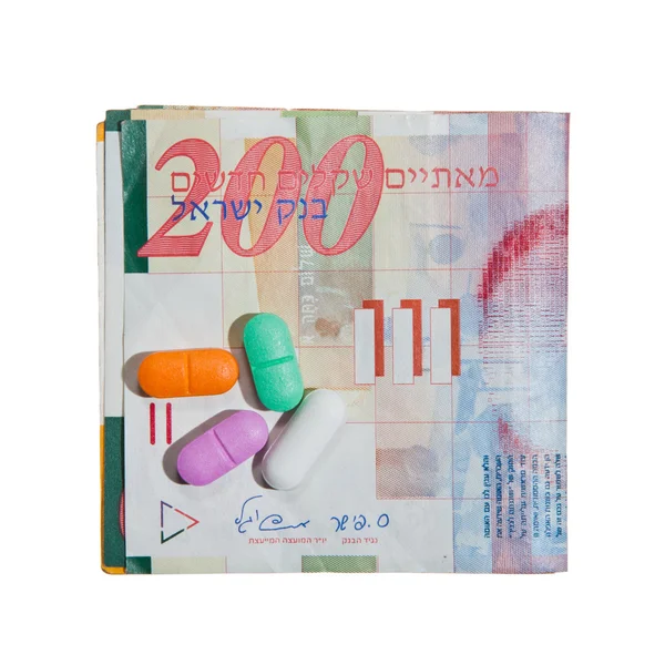 Shekel Currency and Pills — Stock Photo, Image