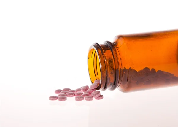 Open bottle of pills — Stock Photo, Image