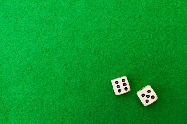 Green casino table with dice background — Stock Photo, Image