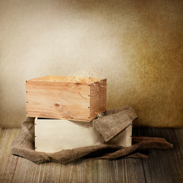 Two wooden boxes wit burlap — Stock Photo, Image