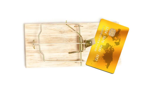 Фото золотої кредитної картки в пастці миші як приманка — стокове фото