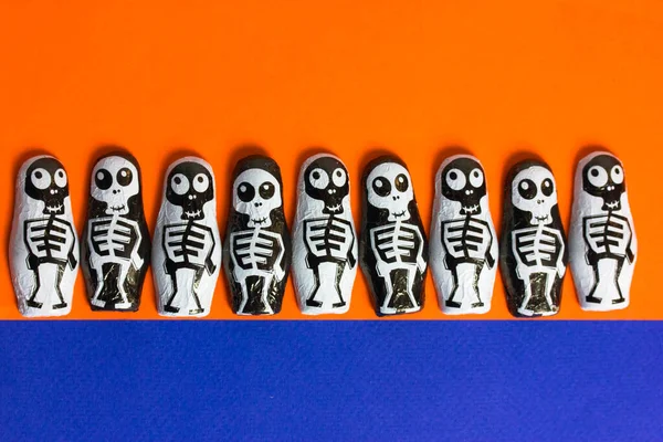 Trick Treat Chocolate Candies Shape Black White Skeletons Bright Orange — Stock Photo, Image