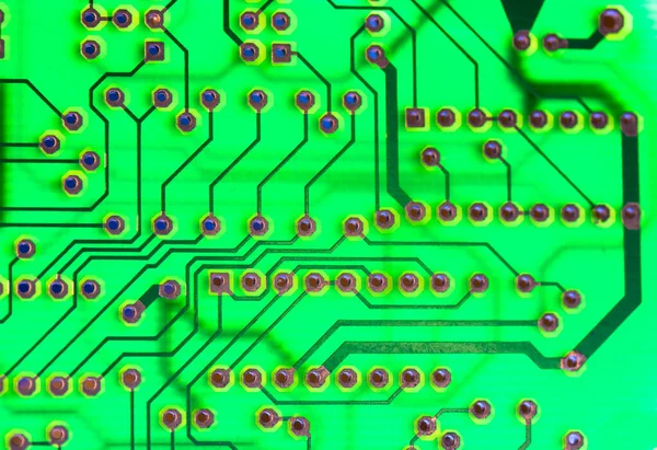 Printed green circuit board close-up. Electronic technology. Motherboard chip. — Fotografia de Stock