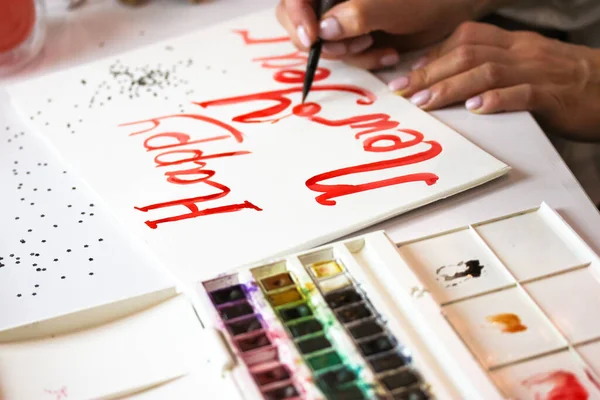 Artist Draws Diy Inscription Happy New Year Red Paint Brush — Stock Photo, Image