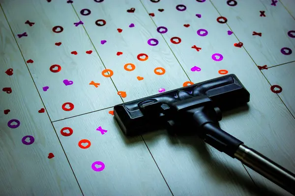 Vacuum Cleaner Cleans White Floor Scattered Heart Shaped Confetti Poppers — Stock Photo, Image