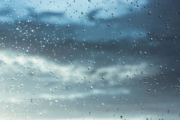 Window Small Raindrops Surface Glass Blue Cloudy Sky Storm Weather — Stock Photo, Image