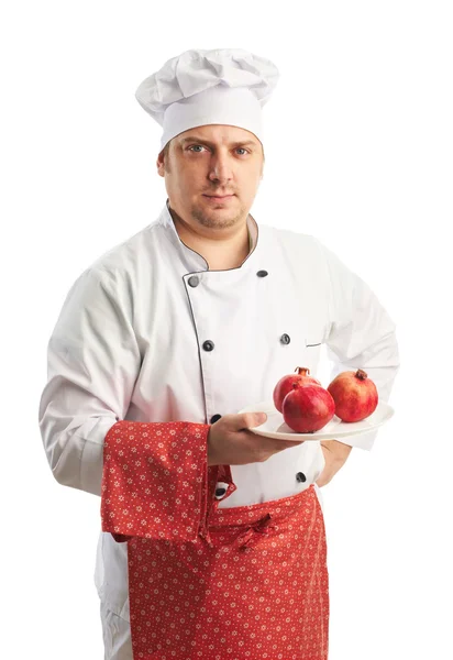 Chef with pomegranates — Stock Photo, Image