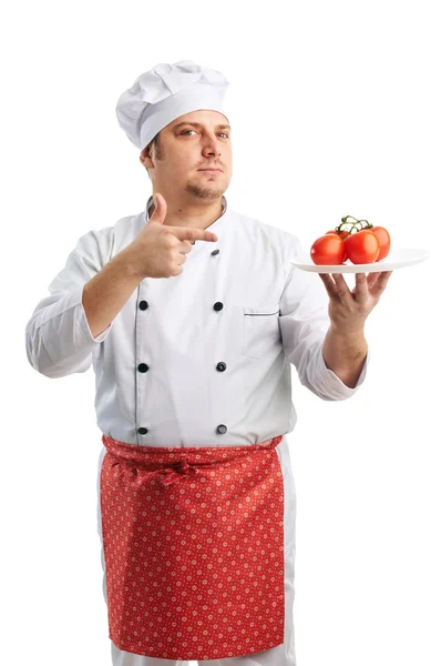 Šéfkuchař s rajčaty — Stock fotografie