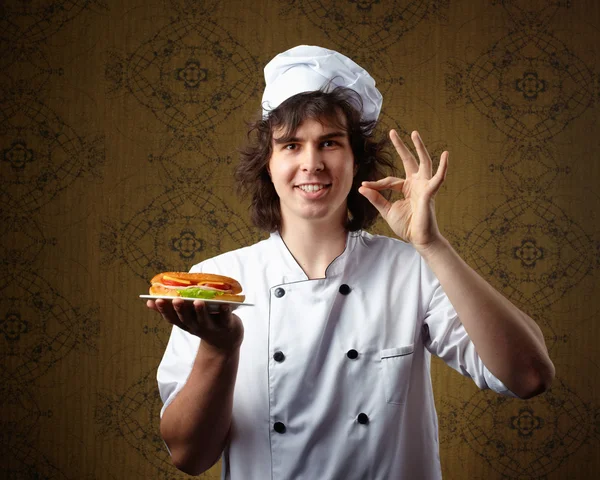 Koch mit Sandwich — Stockfoto