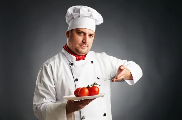 Cuisiner avec des tomates — Photo