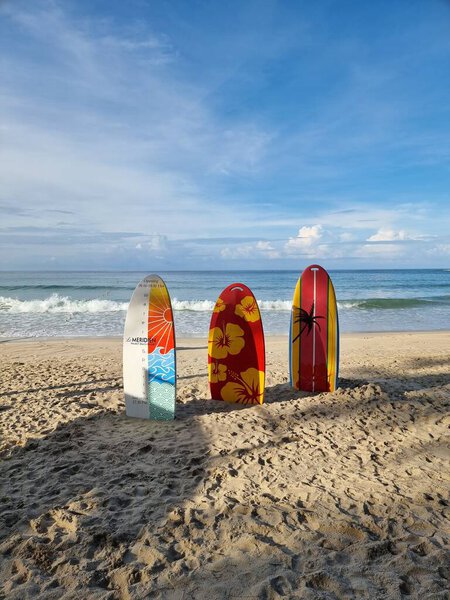 Le Meridien Beach Phuket Thailand white sand tropical beach with beach chairs