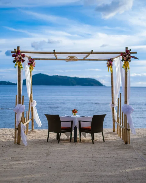 Romantic dinner on the beach in Phuket Thailand, having a dinner on the beach in Thailand during sunset — Stock Photo, Image