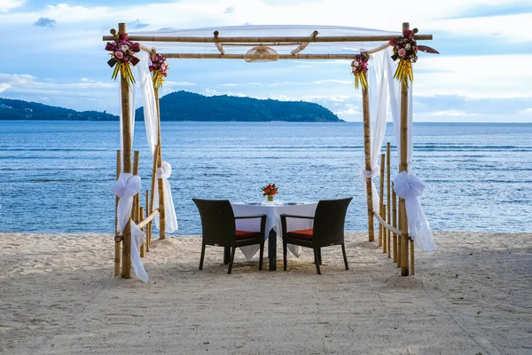 Romantic dinner on the beach in Phuket Thailand, having a dinner on the beach in Thailand during sunset — Stock Photo, Image