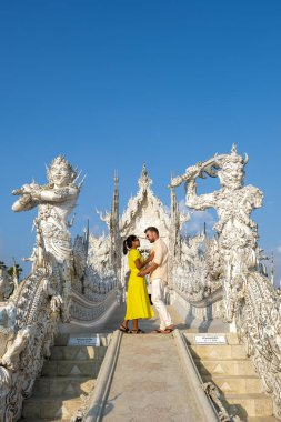 Chiang Rai Tayland, gün batımında Chiangrai tapınağını kırbaçla, Wat Rong Khun, nam-ı diğer Beyaz Tapınak, Chiang Rai, Tayland. Panorama beyazı tempple Thaialand