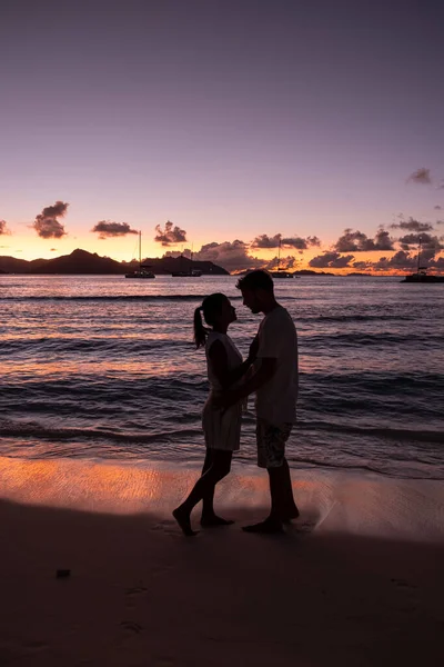 Anse Patates, La Digue Island, Seyshelles, Drone aerial view of La Digue Seychelles bird eye view, mature couple men and women on vacation Seychelles — 스톡 사진