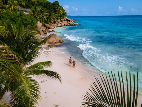 Anse Patates, La Digue Island, Seyshelles, Drone aerial view of La Digue Seychelles bird eye view, mature couple men and women on vacation Seychelles — Stockfoto