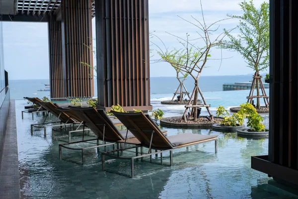 Pattaya Thailand, modern Hilton hotel at ocean front beach road Pattaya modern infinity pool — стокове фото