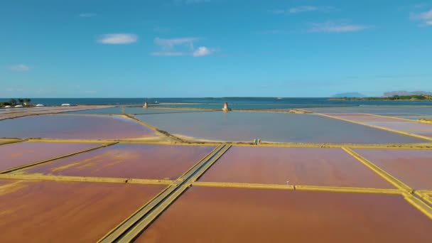 Natural reserve of the Saline dello Stagnone, near Marsala and Trapani, Sicily.,Aerial picture of Trapani salt evaporation ponds and salt mounds — Stock Video