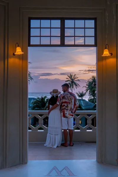 Men Women Watching Sunset Balcony Condo Apartment Ocean Thailand — Stock Photo, Image