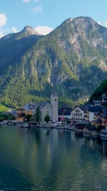 postcard view of famous Hallstatt mountain village in the Austrian Alps in beautiful light in summer, Salzkammergut region, Hallstatt, Austria. Europe. 