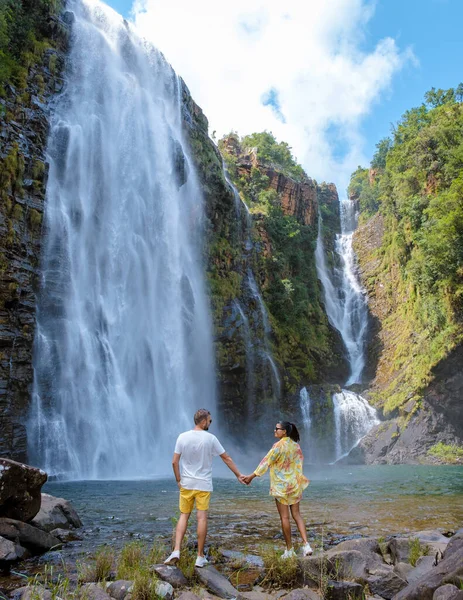 Panorama Route South Africa, Lisbon Falls South Africa, Lisbon Falls is the highest waterfall in Mpumalanga, South Africa. Asian women and caucasian men on vacation in South Africa