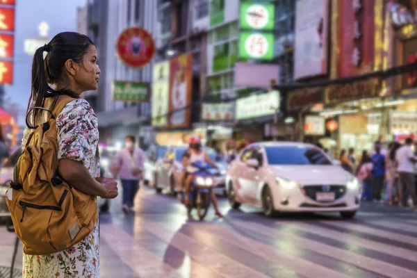 China town Bangkok Thailand, colorful streets of China Town Bangkok.Asian woman with bag, tourist visiting Chinatown