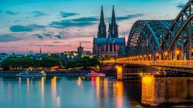 Cologne Koln Germany during sunset, Cologne bridge with the cathedral. beautiful sunset at the Rhine river