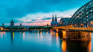 Cologne Koln Germany during sunset, Cologne bridge with the cathedral. beautiful sunset at the Rhine river