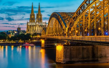 Cologne Koln Germany during sunset, Cologne bridge with the cathedral. beautiful sunset at the Rhine river