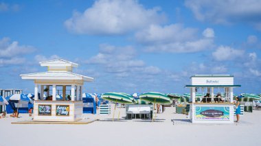 Miami Beach Florida May 2022 colorful beach with umbrellas and beach huts. 